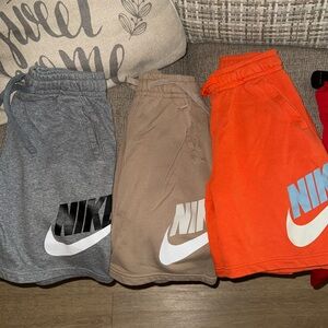 Nike boy shorts 6 in total 1 pair is swimming trunks all size large